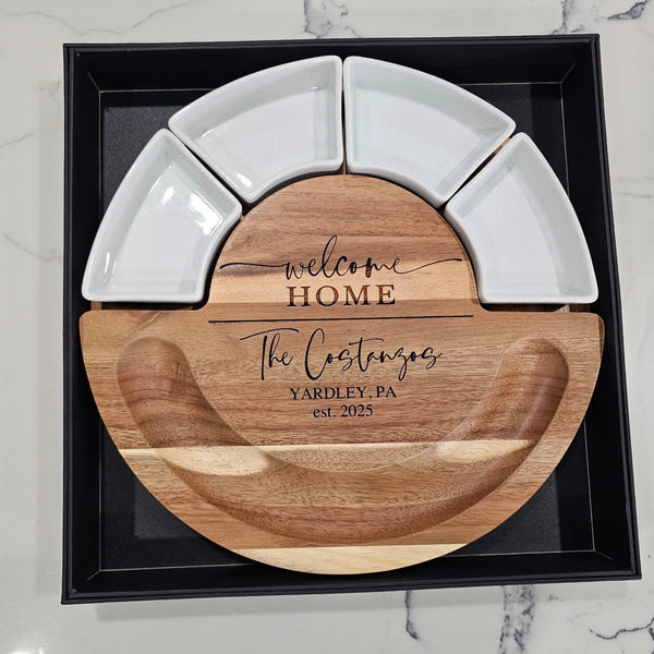 Wooden and ceramic appetizer set with personalized engraving on a marble surface