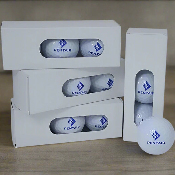 Pentair golf balls in packaging on a white background