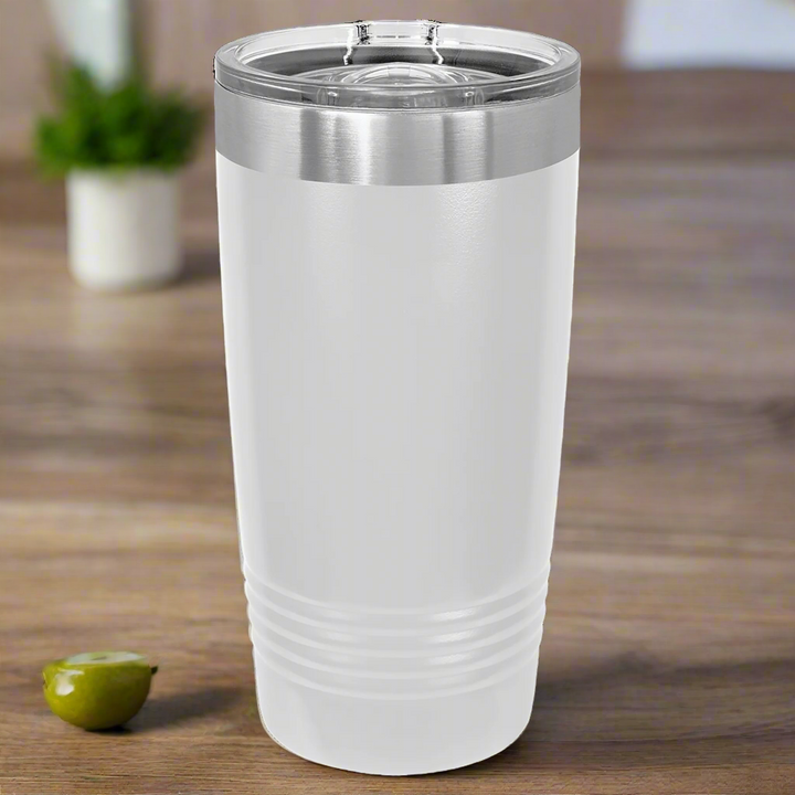 White tumbler with a silver lid on a white background